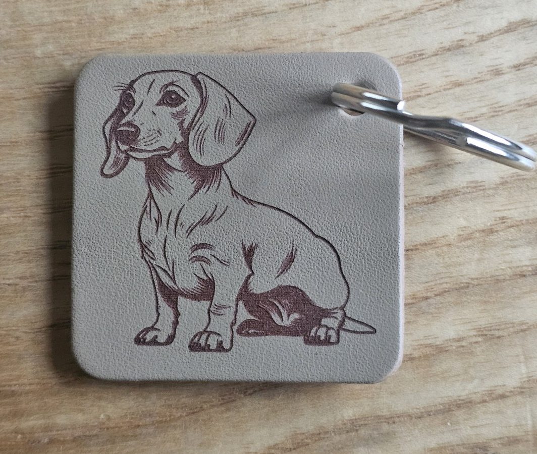 Raktų pakabukas "Taksas"