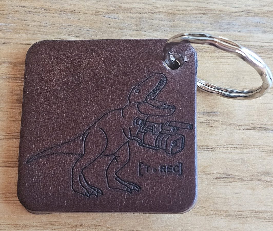 Raktų pakabukas "Tamsus T Rec"